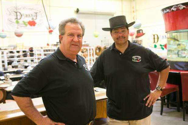 David Johnson and Raphael Diniz, owners of D Bar J Hat Company, stand in their 6,500 sq. ft. facility, Wednesday June 5, 2013.